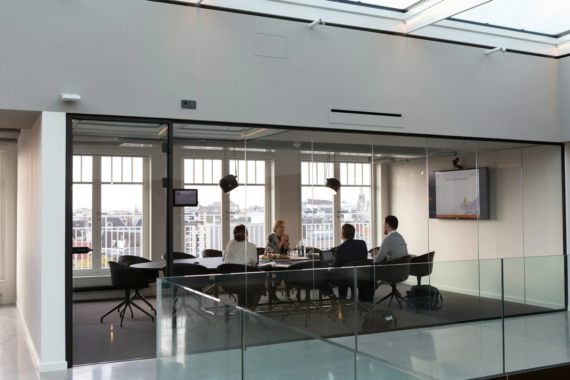 Leadership team meeting in a contemporary office